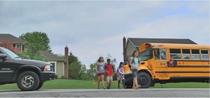 School bus dropping kids off